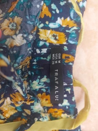 Shorts florales y vaqueros niña Talla M