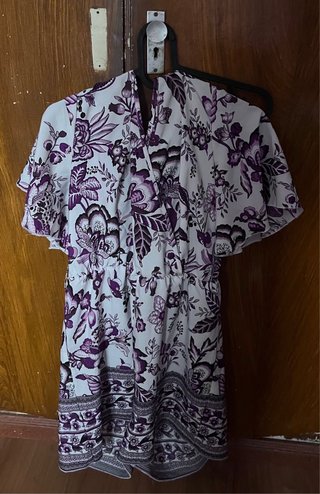 Mono floral morado y blanco