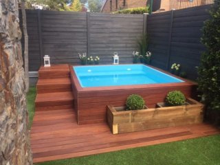 Piscinas con jacuzzi construcciones Construcción p