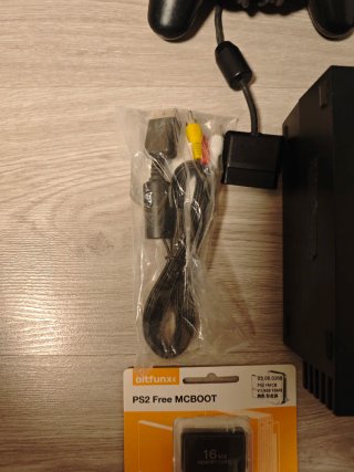 PS2 Negra con 2 Mandos y Tarjeta Memoria
