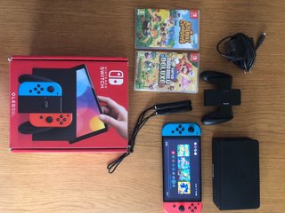 Nintendo Switch OLED + Juegos + Caja