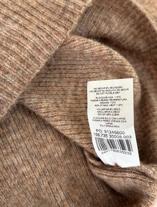 Jersey (mujer) de punto marrón con volante blanco