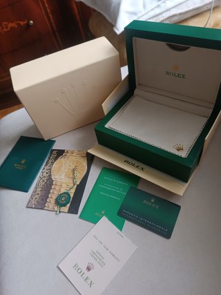 Caja y documentación Rolex