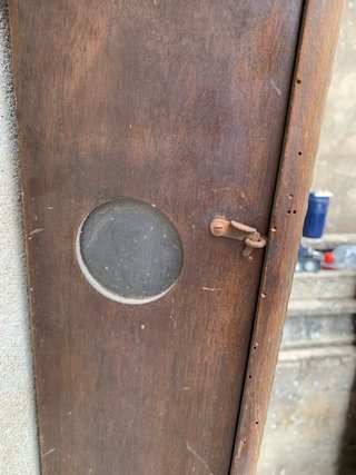Reloj de pared antiguo de madera
