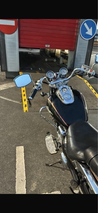 Moto Daelin Daystar 125 con alforjas y respaldo
