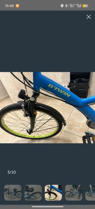 Bicicleta BTWIN hibrida  azul con cesta