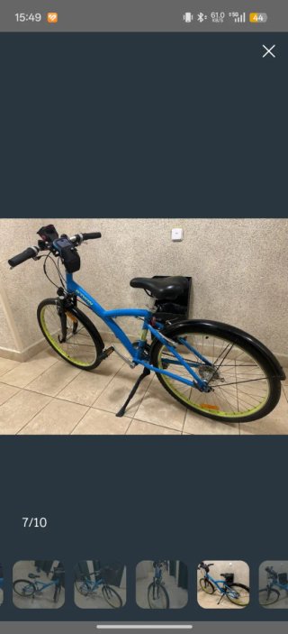 Bicicleta BTWIN hibrida  azul con cesta