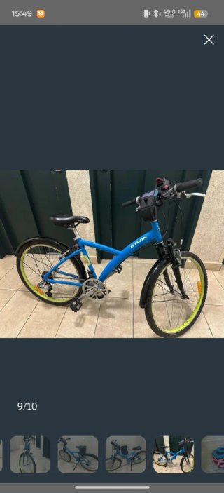 Bicicleta BTWIN hibrida  azul con cesta