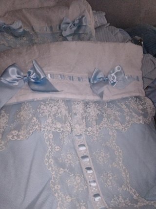 Saco para silla de bebé azul con lazos