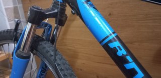 Bicicleta Montaña BTWIN Azul, amotiguador delanter