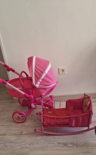 Coche y cuna para muñecas rosa