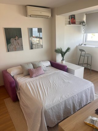 Sofá cama morado tela