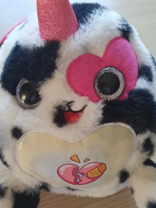 Peluche unicorno con cuore e corno glitter