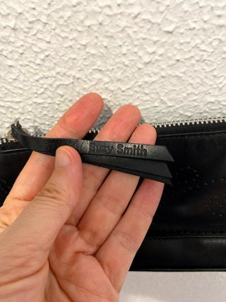 Bolso piel negro Suzy Smith con cadena
