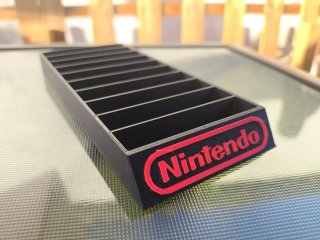 Soporte para juegos Game Boy con caja