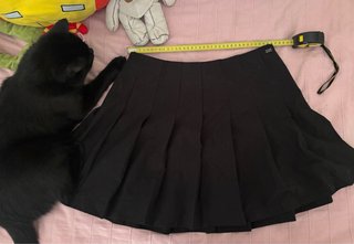 Falda corta negra de tablas talla L de Pull&Bear