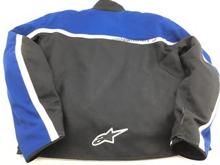 chaqueta motorista alpinestars azul letras blancas