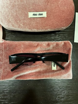 Occhiali Miu Miu Neri Vetri Bianchi