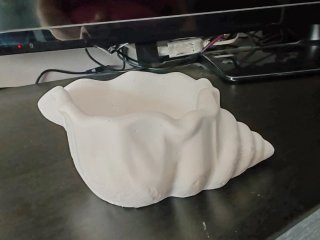 Portacandele/svuotatasche gesso a forma di conchig