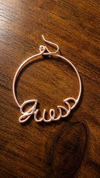 Pendientes Guess Aro rosa dorado