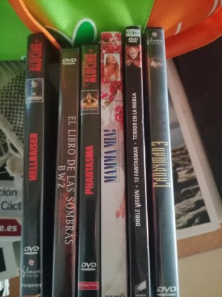 Consola PS2 con 2 mandos y 40 películas