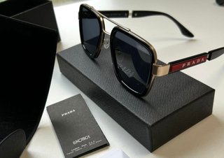 Gafas de Sol Prada Negras y Doradas