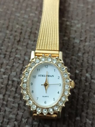 Reloj STELLMAN dorado con pedrería