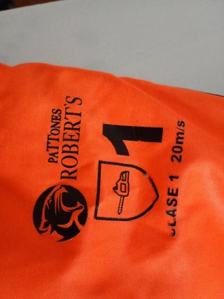 Pantalón trabajo anticorte naranja y negro