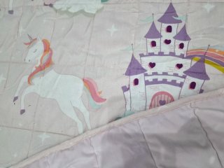 Manta ponderada unicornios