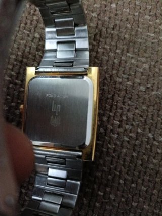 Reloj Lip Cuadrado Dorado y Plateado