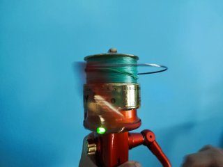 Carrete de pesca TENAX, con iluminación al recoger