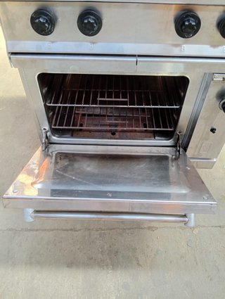 Cocina 4 fuegos con horno