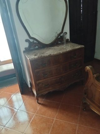 Dormitorio madera maciza tallada