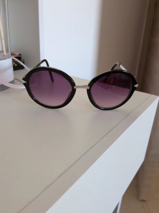 Occhiali da sole Swarovski neri e viola