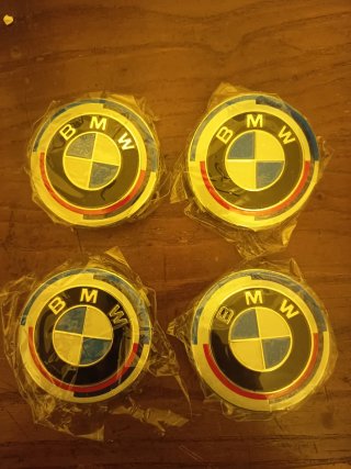 4 Tapas llantas BMW 50 años.