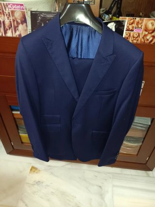 Traje de chaqueta azul hombre.