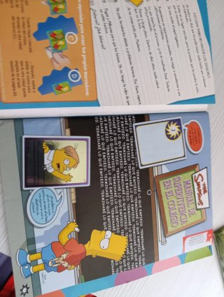 Lote 2 Álbumes: The Simpsons y Mundo Canino