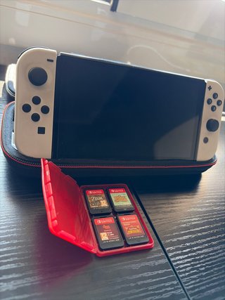 Nintendo Switch OLED + 4 Juegos