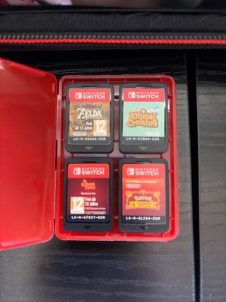 Nintendo Switch OLED + 4 Juegos
