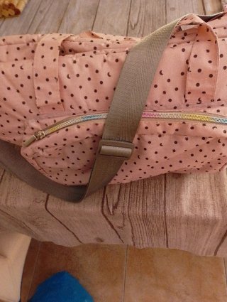 Bolsa y cambiador bebé lunares rosa,