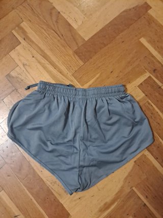 Pantalón corto atletismo junior Reebok gris