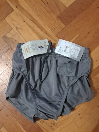 Pantalón corto atletismo junior Reebok gris