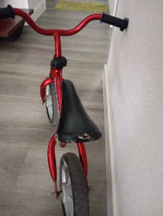 Bicicleta aprendizaje Chicco roja
