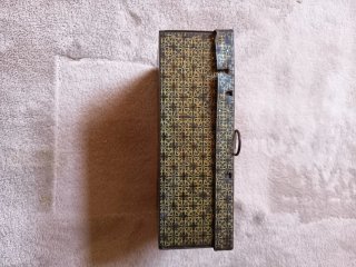 Mini imprenta antigua con tipos móviles