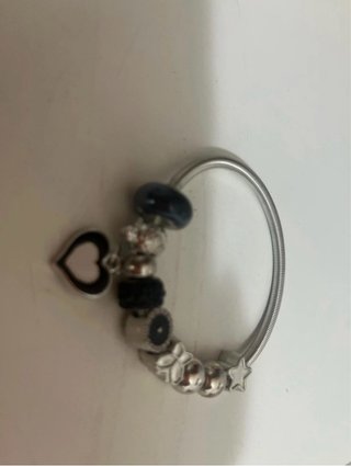 Bracciale con ciondoli cuore e stella