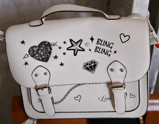 Bolso blanco con dibujos