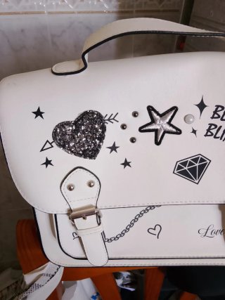 Bolso blanco con dibujos