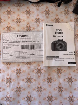 Cámara Canon EOS 1300D Negra + cargador de bateria