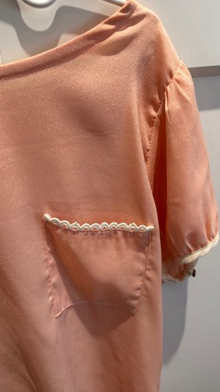 Camisa rosa con lazos