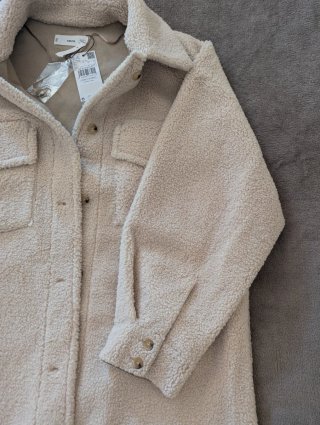 Chaqueta de pelo sintético beige